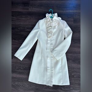 Elegant White Coat with Floral Accents